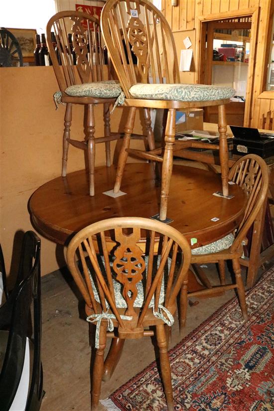 Circular pine table and four chairs